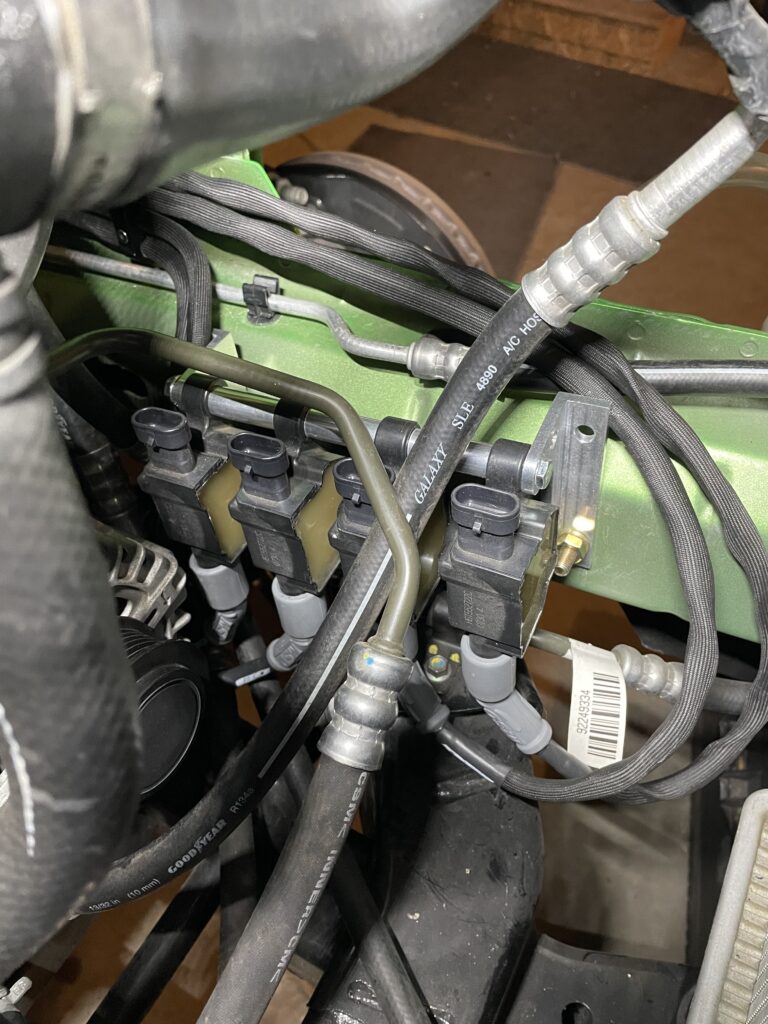 Relocated coil packs with custom spark plug wires routed in the engine bay
